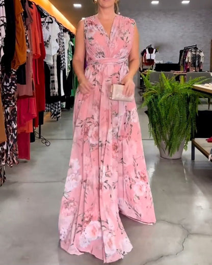 Gia - Robe longue sans manches à fleurs avec fente