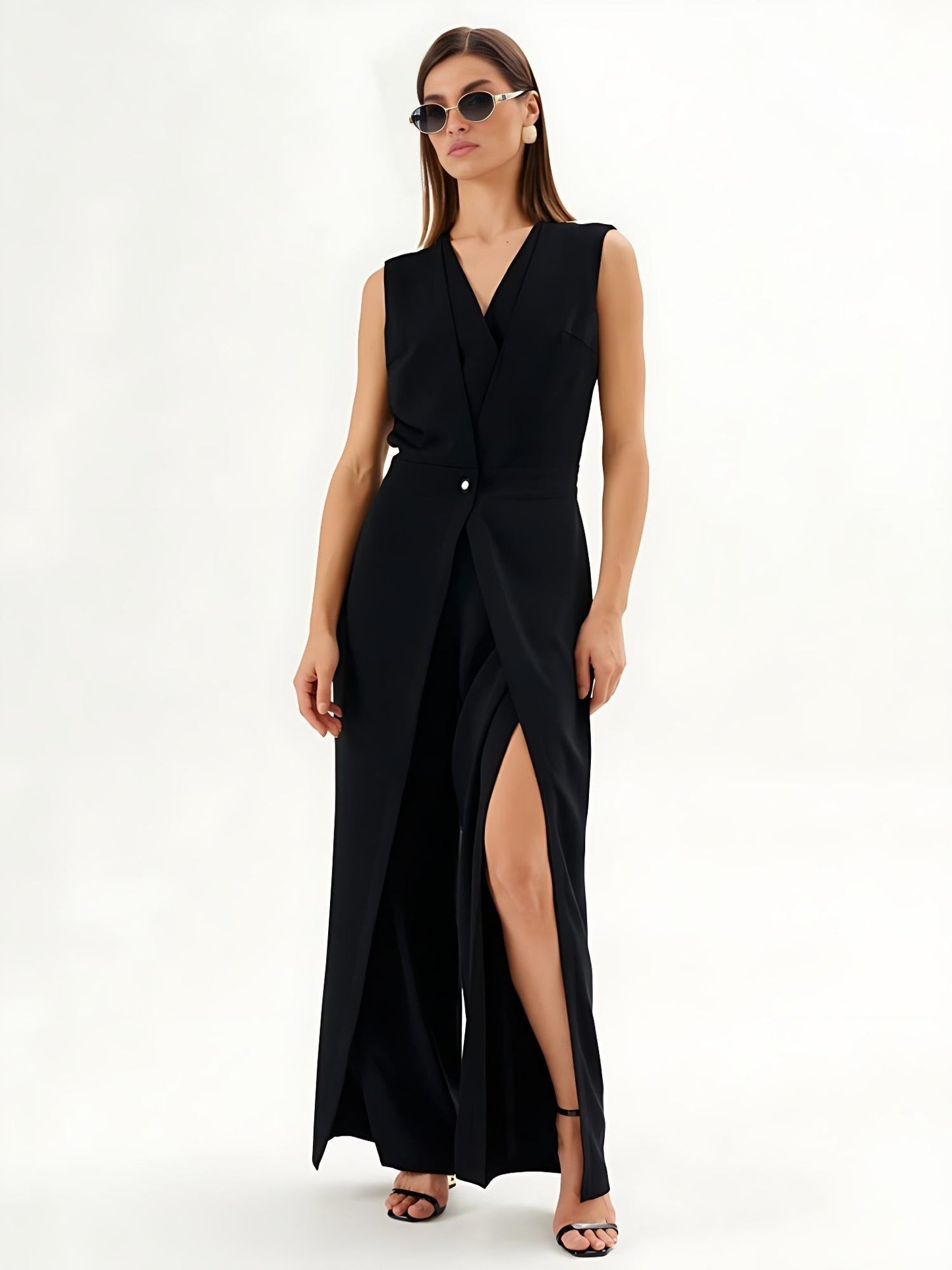 Mono noir sans manches avec effet enveloppant et jambes larges