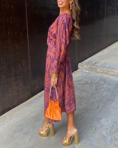 Grace – Robe midi élégante avec imprimé floral et nœud
