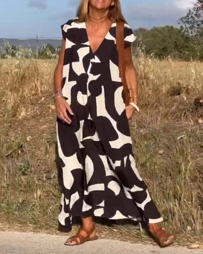 SITA - Robe à imprimé et décolleté en V