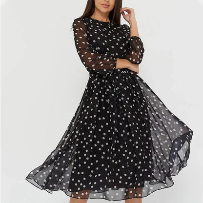 Delfie – Robe Midi à Pois Fluides