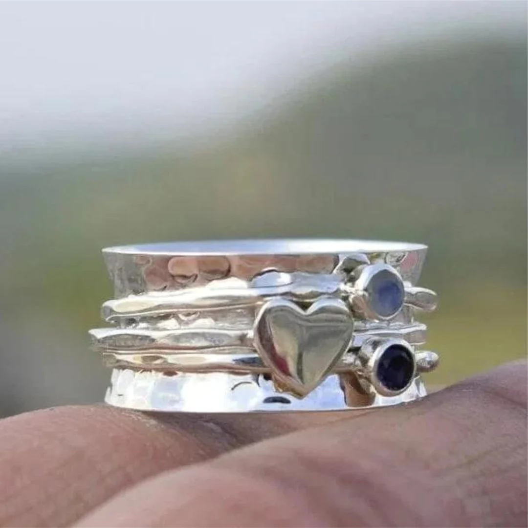 Bague élégante en forme de cœur rotatif en argent sterling